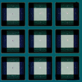 A sample extract. The white dots in the middle of the light squares are holes formed after treating the layer with an X-ray pulse.